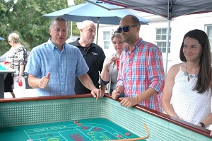 People having fun at a craps table party in Maryland