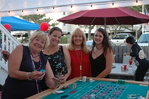 Women having fun at a roulette table party in Maryland